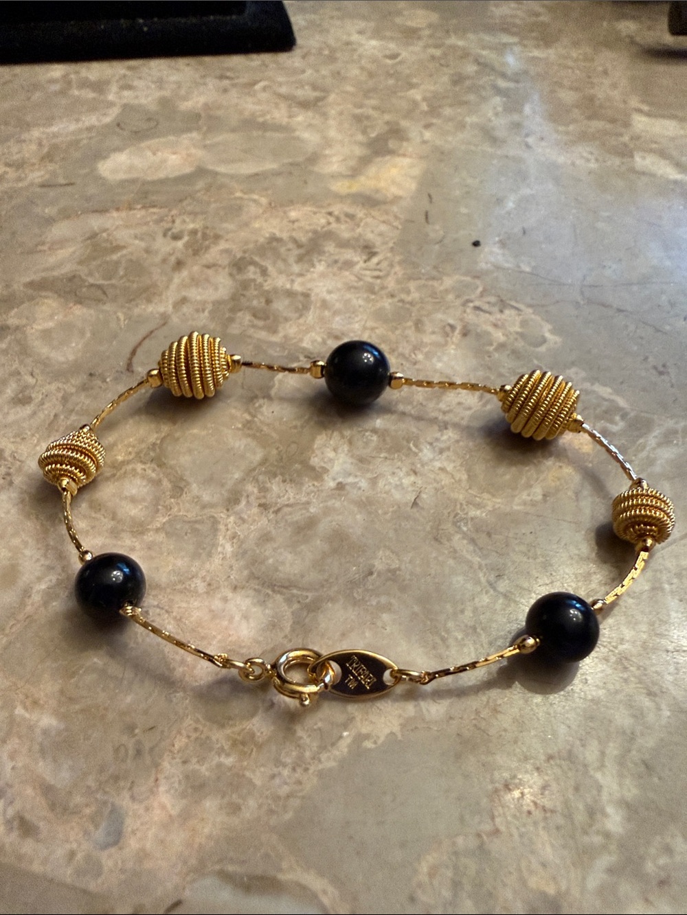 NWOT vintage Trifari, beehive, bead, gold tone, and black glass bracelet